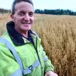 Thomas-Fouhy-standing-in-his-7-year-continuous-oat-trail-ripening