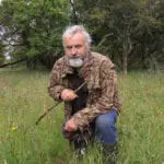 Noel Kiernan in meadow inchbofin with narrow-leaved plantain cmacl